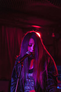 Young woman wearing mask