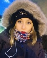 Portrait of young woman wearing hat