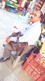 High angle view of man holding food