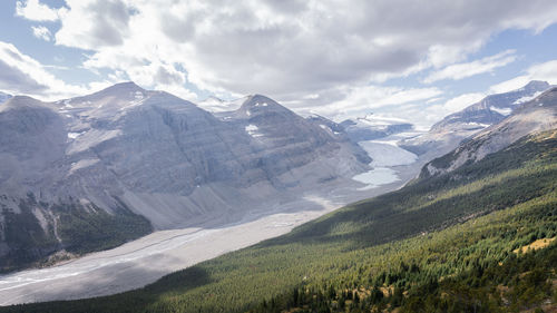 Beautiful pristine alpine valley surrounded by mountains and with glacier on its end, jasper, canada