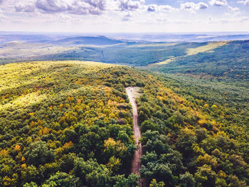 High angle view of trees and mountains against sky