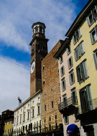 Low angle view of clock tower against sky