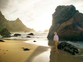 Scenic view of beach against sky