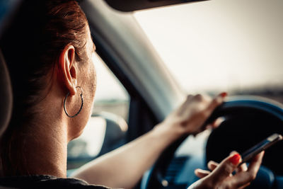 Portrait of woman in car