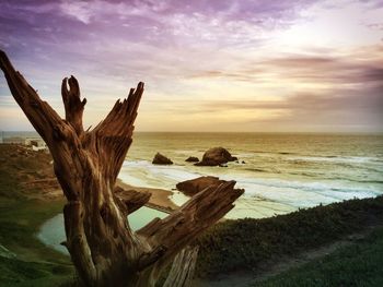 Scenic view of sea against cloudy sky