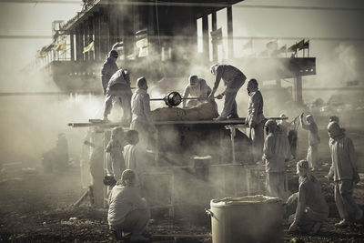 Group of people working at construction site