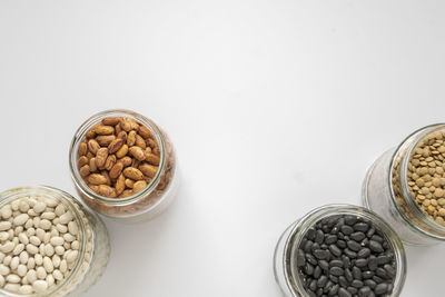 Close-up of candies against white background