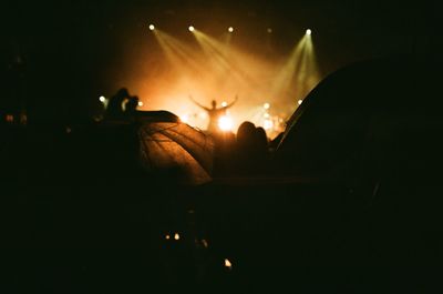 Silhouette people at concert