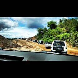 Road seen through car windshield