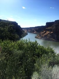 Scenic view of river against clear sky