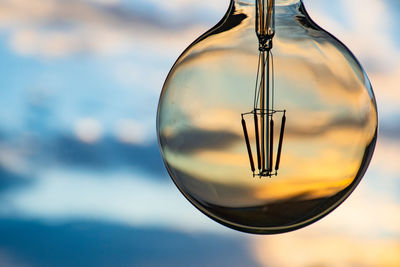 Beautiful defocused sunset in a light bulb. sunset or sunrise background. electricity 