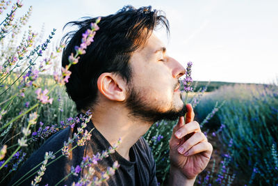 Close-up of man at field