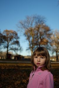 Close-up portrait of girl in park