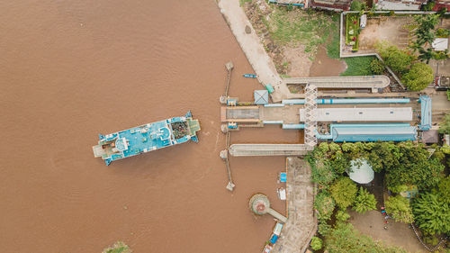 Passenger ship docking on riverside of kapuas river at pontianak city