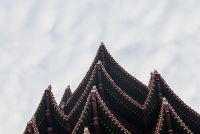 Low angle view of pagoda against sky