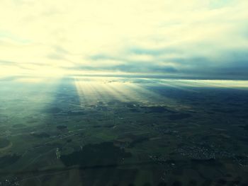 Aerial view of landscape against sky during sunset