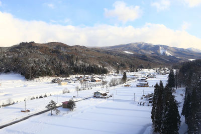 Scenic view of snowcapped mountains against sky