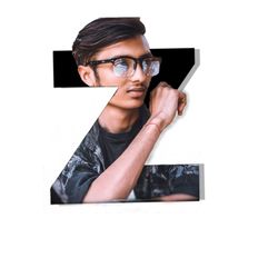 Portrait of young man holding eyeglasses against white background