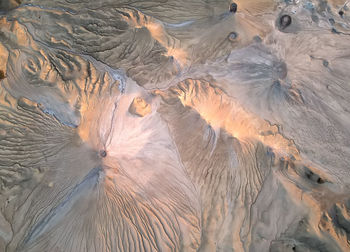 High angle view of water flowing through rocks