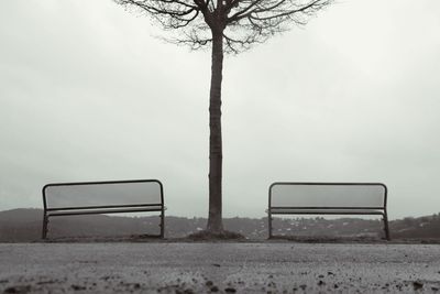 Scenic view of field against sky during winter