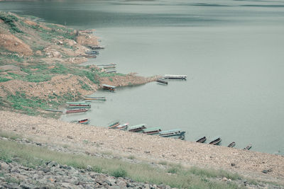 High angle view of boats moored at beach