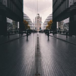 Reflection of street by tower bridge on glass