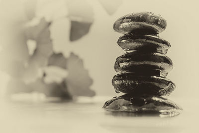 Close-up of stack of stones on table