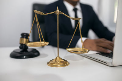 Close-up of electric lamp on table