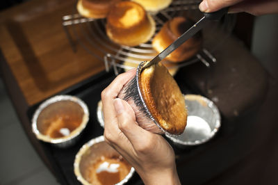 Close-up of man preparing food