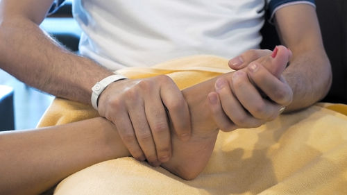 Close-up of man holding hands