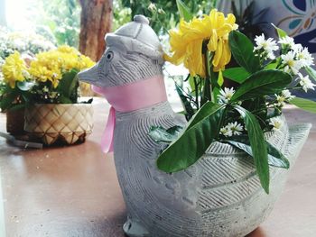 Close-up of potted plants on table