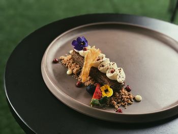 Close-up of cake served on table