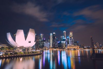 Illuminated city at waterfront