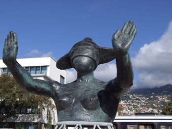 Close-up of statue against sky