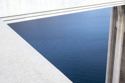 High angle view of swimming pool by sea