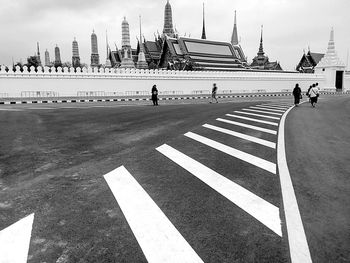 People on zebra crossing in city