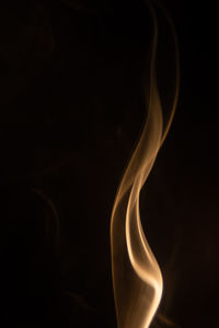 Close-up of smoke against black background