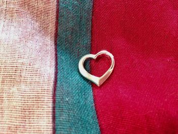 Close-up of heart shape on fabric