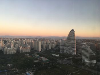 High angle view of cityscape at sunset