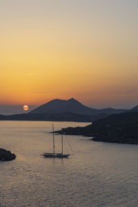 Scenic view of sea against clear sky during sunset