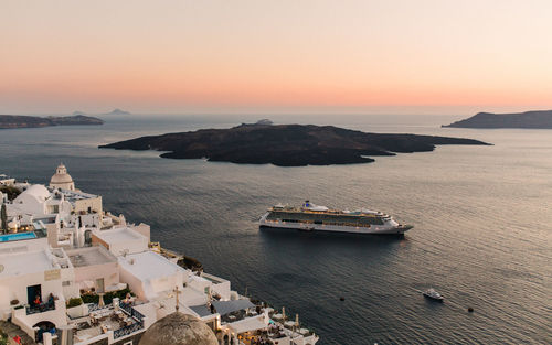 High angle view of cruise ship in sea during sunset