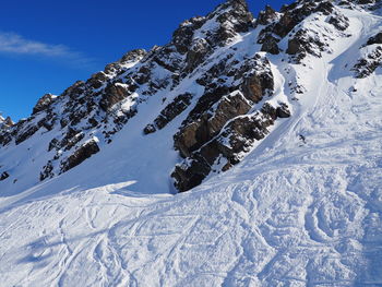 Scenic view of snow covered mountains