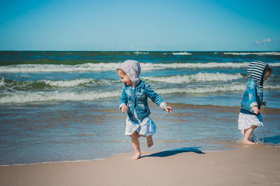 Full length of girl on beach