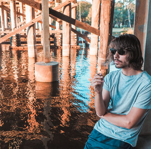 Boy standing in water