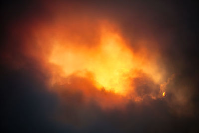 Low angle view of orange sky at night