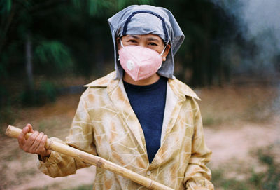 Portrait of man standing outdoors