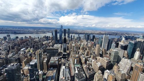 Aerial view of cityscape against sky