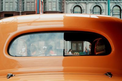 Reflection of car on window