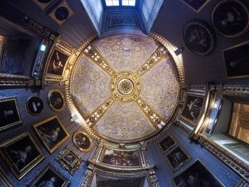 Low angle view of ornate ceiling in building