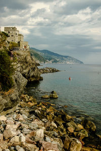 Scenic view of sea against cloudy sky